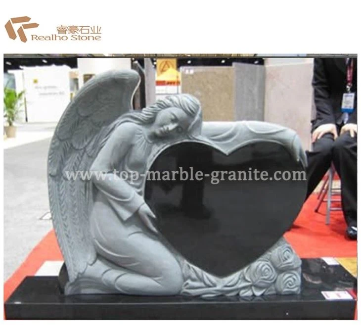 carved granite tombstone